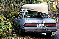 /images/133/1998-05-tempo-temagami-canoe.jpg - #00093: returning 1 day late, after storm on Rabbit lake … my blue 1986 Ford Tempo … Sept 1998 -- Temagami, Ontario.Canada