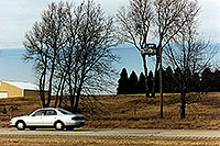 /images/133/1999-02-wisconsin-tree-car.jpg - #00278: in the trees … south Wisconsin …  Feb 1999 -- Oshkosh, Wisconsin