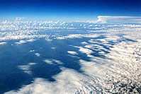 /images/133/1999-08-chgo-phx-plane-sky.jpg - #00334: above the clouds, somewhere between Chicago and Phoenix … August 1999 -- Kansas