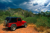 /images/133/2000-08-sedona-red-jeep.jpg - #00593: red Jeep Wrangler during monsoon season at Wet Beaver Creek by Sedona … August 2000 -- Sedona, Arizona
