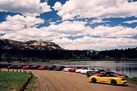 /images/133/2004-07-estes-transams2.jpg - #01651: yellow, red, black and white Pontiac TransAm cars at Estes Lake … July 2004 -- Estes Park, Colorado