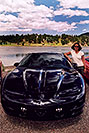 /images/133/2004-07-estes-transams6-v.jpg - #01655: Ola with a black Pontiac TransAm at Estes Lake … July 2004 -- Estes Park, Colorado