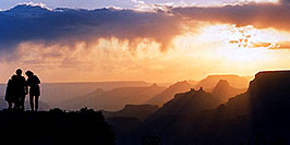 /images/133/2004-07-grand-3-sunset-pano.jpg - #01667: Silhouettes of Aneta, Ewka and Ola (left to right) at sunset in Grand Canyon … July 2004 -- Navajo Point, Grand Canyon, Arizona