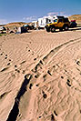 /images/133/2004-07-powell-yellow-jeep-sand-v.jpg - #01766: yellow Jeep Wrangler at Lone Rock … July 2004 -- Lone Rock, Lake Powell, Utah