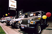 /images/133/2004-11-lithia-jeep1.jpg - #02397: brown, white and blue Jeep Wranglers at Lithia Jeep in Centennial, Colorado … Nov 2004 -- Lithia Jeep, Centennial, Colorado