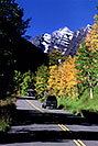 /images/133/2005-09-maroon-road3-v.jpg - #02631: Bus driving from Maroon Bells … images of Maroon Bells … Sept 2005 -- Maroon Bells, Colorado