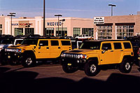 /images/133/2006-02-hummers-medved-02.jpg - #02747: yellow H3 (front)  and yellow H2 Hummers in Castle Rock … Feb 2006 -- Castle Rock, Colorado
