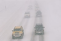 /images/133/2006-03-i70-cars1.jpg - #02804: yellow Hummer H3 and grey Jeep Liberty, during blizzard on Highway I-70 west of Golden, heading to Denver … March 2006 -- I-70, Golden, Colorado