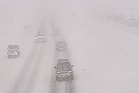 /images/133/2006-03-i70-cars2.jpg - #02805: Jeep Wrangler and cars, during blizzard on Highway I-70 west of Golden, heading to Denver … March 2006 -- I-70, Golden, Colorado