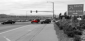 /images/133/2006-10-06-lone-red-jeep-bw.jpg - #02939: red Jeep Wrangler exiting on Lincoln Road… Oct 2006 -- Lincoln Rd, Lone Tree, Colorado