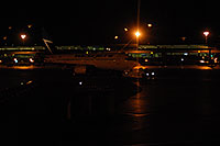 /images/133/2006-10-13-tor-airport03.jpg - #03006: Westjet plane at Toronto airport at night  … Oct 2006 -- Pearson Intl. Airport, Toronto, Colorado