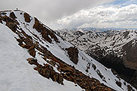 /images/133/2007-06-10-elbert-summit01.jpg - #03909: Hiker walking at the summit of Mt Elbert  … June 2007 -- Mt Elbert, Colorado
