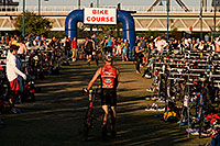 /images/133/2009-10-25-soma-transition-118198.jpg - #07728: 00:49:50 Swimmers transitions to bikes at Soma Triathlon … October 25, 2009 -- Tempe Town Lake, Tempe, Arizona