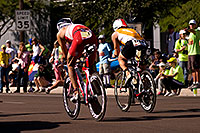 /images/133/2009-11-22-ironman-bike-pro-126521.jpg - #07917: 05:15:12 #1 passing #1789 and about to finish the bike stage - Ironman Arizona 2009 … November 2009 -- Rio Salado Parkway, Tempe, Arizona