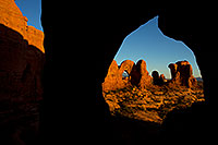 /images/133/2010-09-16-arches-cove-34439.jpg - 08694: View of Double Arch through Cove Arch in Cove of Caves in Arches National Park … September 2010 -- Cove Arch, Arches Park, Utah