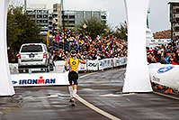 /images/133/2010-11-21-ironman-finish-45875.jpg - #08912: 08:06:27 - #9 Timo Bracht [1st,GER,08:07:16] finishing first - Ironman Arizona 2010 … November 2010 -- Rio Salado Parkway, Tempe, Arizona