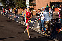 /images/133/2010-11-21-ironman-finish-45935.jpg - #08915: 08:15:28 - #1 Jordan Rapp [4th,USA,08:16:45] finishing fourth - Ironman Arizona 2010 … November 2010 -- Rio Salado Parkway, Tempe, Arizona