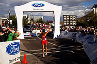 /images/133/2010-11-21-ironman-finish-46010.jpg - #08917: 08:35:18 - #55 Chrissie Wellington [1st,USA,08:36:13] finishing first - Ironman Arizona 2010 … November 2010 -- Rio Salado Parkway, Tempe, Arizona