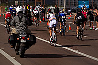 /images/133/2010-11-21-ironman-pro-bike-44995.jpg - #08940: 03:44:36 - #1 Jordan Rapp [4th,USA,08:16:45] in red finishing Lap 2 - Ironman Arizona 2010 … November 2010 -- Rio Salado Parkway, Tempe, Arizona