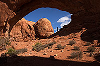 /images/133/2013-10-29-windows-north-1dx_1913.jpg - #11182: Hiker in North Window in Arches National Park … December 2013 -- North Window, Arches Park, Utah