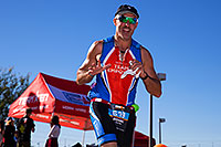/images/133/2014-11-16-ironman-run-1dx_4295.jpg - #12265: 07:38:55 Running at Ironman Arizona 2014 … November 2014 -- Tempe Town Lake, Tempe, Arizona