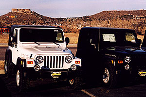 white and black Jeep Wrangler Rubicons in Castle Rock
