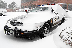 Lone Tree Police car during a December snowstorm