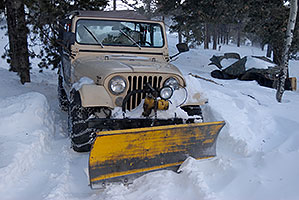 Jeep Wrangler with a snowplow