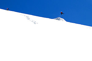 Snowboarder in flight in backcountry Loveland Pass