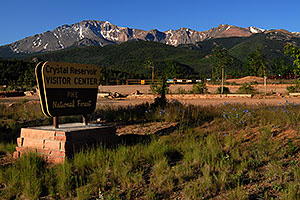 Crystal Reservoir Visitor Center with Pikes Peak in the background