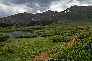 Hikers returning from Mt Bierstadt (14,060 ft, right) â€¦ Mt Spalding (13,842 ft, left), The Sawtooth (13,780 ft, middle)