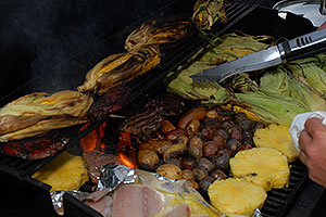 Corn, Beef, Potatoes, Fish and Pineapple on the grill
