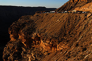 View of parking lot of Hualapai Hilltop (5,194 ft) with 1,200 ft elevation drop to the Havasu Canyon