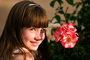 Alexandra by a flower