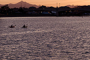 2 Kayakers rowing at Tempe Town Lake