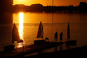 Kids Sailboats at North Bank Boat Ramp at sunset at Tempe Town Lake