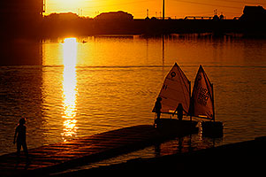 Kids Sailboats at North Bank Boat Ramp at sunset at Tempe Town Lake