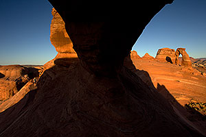View of Delicate Arch through a window in Arches National Park