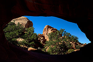 View through the Double O Arch in Arches National Park