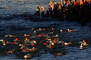 00:17:07 Red and White Caps swimming at Tempe Triathlon in Tempe Town Lake