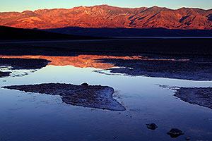 Badwater morning mountain reflection in Death Valley