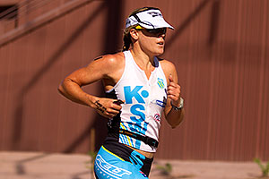 03:13:23 #1 Lead Female running at Soma Triathlon 2011 - Go Go Baby on her hand