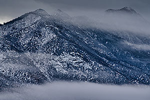 Fog and snow on Santa Rita Mountains