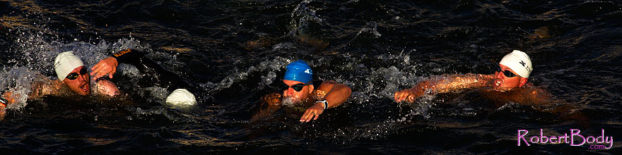 /images/500/2011-05-15-tempe-tri-swim-68796sp.jpg - #09200: 00:12:17 Blue and White Caps swimming at Tempe Triathlon in Tempe Town Lake … May 2011 -- Tempe Town Lake, Tempe, Arizona